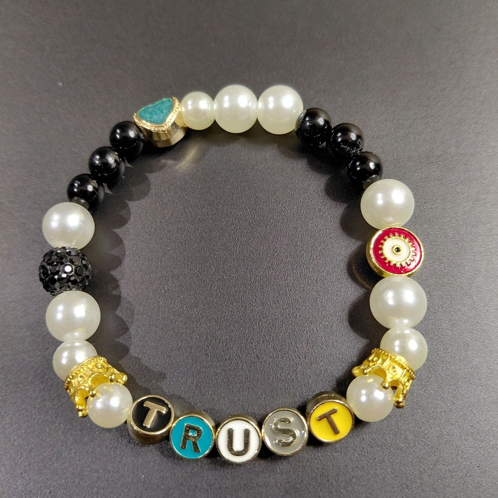 Trust Beaded Bracelet with Gold and Black Accents